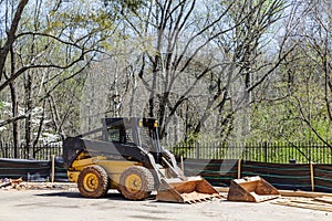 Front End Loader at Silt Fence