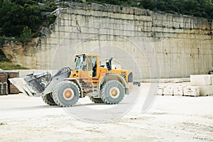 Front-end Loader in a Stone Qu