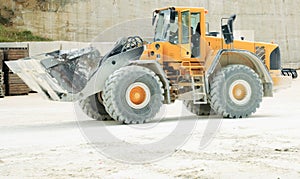 Front-end Loader in a Stone Qu