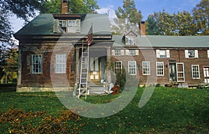 Front exterior of rundown home, New England