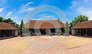 Front exterior view of Mong Phu communal house, a national relic in Duong Lam ancient village, Son Tay district, Hanoi, Vietnam.