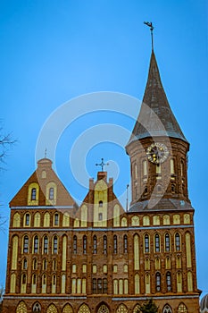 The front facade of the Cathedral against the background of the turquoise sky on the island of Kant, Kaliningrad, Russia