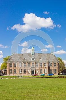 Front facade of the historic school building in Veendam