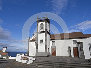 Front facade of typical azorean church of Igreja da Nossa Senhora da Anunciacao in village Achada, Sao Miguel, Azores photo