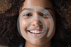 Front face view of beautiful smiling teen age girl