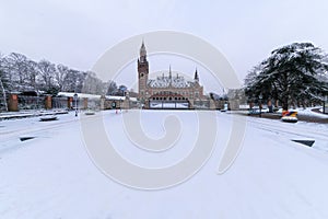 Front frozen Peace Palace garden, International Court of Justice, under the Snow