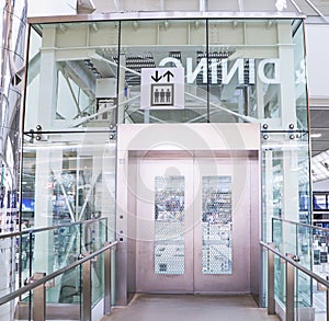 Front hydraulic Glass Lift or Elevator (capsule lift) at Narita Airport.