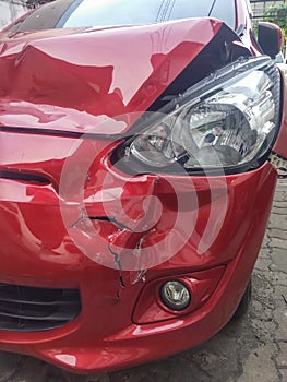 Front left red car accident