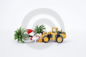 Front loader truck moving Beach chair and coconut tree