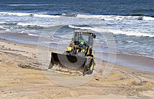 Front loader on Vilano Beach, Florida following Hurricane Matthew photo