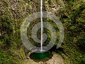 The front of the massive 100m high waterfall Levada do Caldeirao Verde on Madeira Island photo