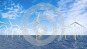 Front movement of the camera from left to right through a group of turbines forming a Wind Farm in the middle of the ocean