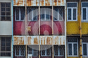 The front of the old commercial building with colorful