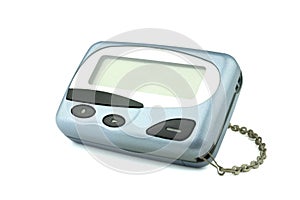 Front old a cyan metallic pager or beeper on white floor and background, isolated with clipping path.