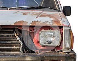 Front of old rusty car isolated on white background