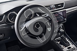 Front panel of brand new modern vehicle with digital tablet and control panel