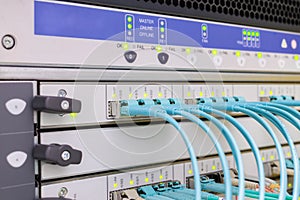 The front panel of the Central router has many fiber-optic wires. High-speed Internet switch interfaces are in the server room.