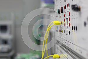 Front panel of electrical equipment with commutation wires and devices