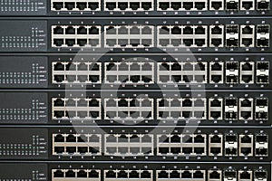 The front panel of Internet equipment installed in the server room. Lots of empty ports on the switch