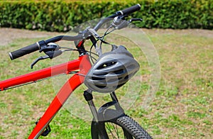 The front part of the bicycle is red-wheel, wheel and frame