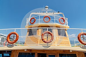 Front of a pleasure craft with lifebuoys