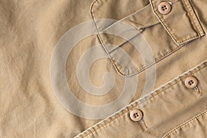 Front pocket on brown shirt textile texture