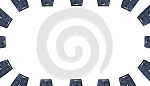 Front pockets, waist areas, zippers, and buttons of 16 pairs of dark blue jeans isolated on white background. Close up shot. Jeans