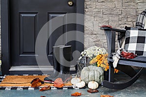 Front Porch Decorated for Autumn with Buffalo Plaid