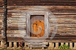 Front porch, door of old rustic log house or cabin