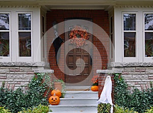 Front porch of house with Halloween decorations