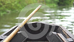 Front portion of a small wooden running boat