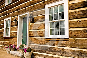 Front of restored log house photo