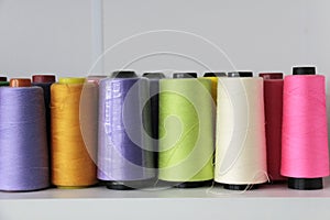 In a front row of thread in spool