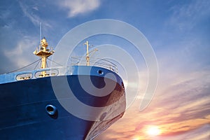 Front ship close up on blue sky and sunset