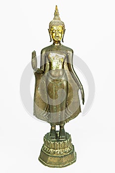 Front side of ancient Buddha metal statue isolated on white background photo
