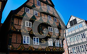 Front side of the renovated facade of a half-timbered house in the old town