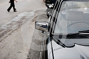 Front-side view of classic black car