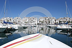 Front of Speedboat in port photo