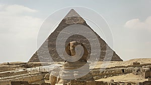 The front of the sphinx and pyramid of khafre at giza near cairo