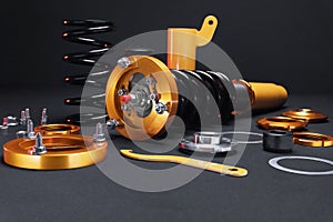 front springs in yellow and gold colors for a sports drift car on a dark background