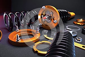 front springs in yellow and gold colors for a sports drift car on a dark background