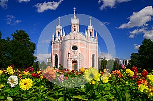in front of St. John& x27;s Church, the Baptist , there are colorful flower gardens that are blooming at St. Petersburg , Russia