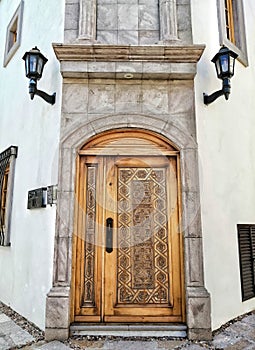 Front symmetric symmetry shot of a very ornamented typical door in san miguel de allende guanajuato