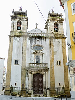 in front of the SÃ£o Bartolomeu church in the city of Coimbra.
