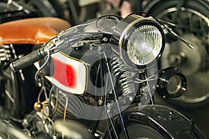 Front, tank and lamp of a historic motorcycle