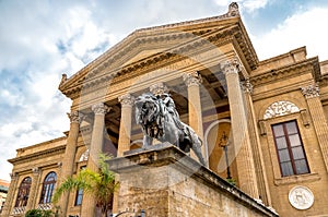 Front of the Theater Massimo Vittorio Emanuele with lion statue in Palermo, Italy.