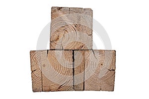 The front of three wooden blocks. Pieces of wood shown in cross section