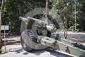 Front view of a 155mm Vietnam War artillery on display at Cu Chi Tunnels in Saigon, Vietnam