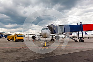 Front view of airplane at gate