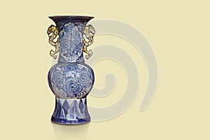front view antique large blue and gold ceramic vase on yellow background, object, decor, fashion, gift, home, house, copy space